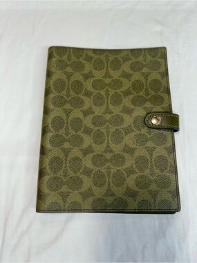 Coach Notebook
In Signature Canvas. New no tag .